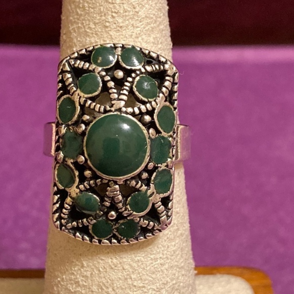 Silver tone and green enamel design ring